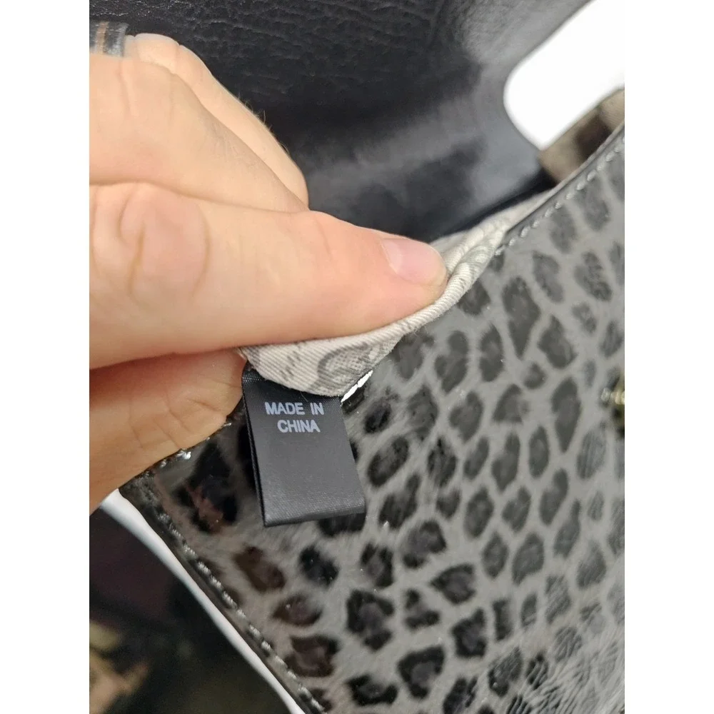Guess Laurita LE259506 Black Leopard Print Patent Bow Flap Shoulder Handbag NWT